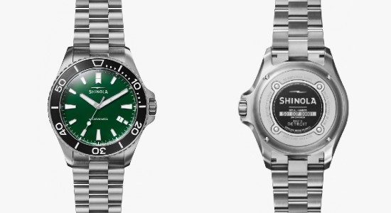 Front and back images of a silver Shinola watch with a green dial
