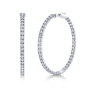 A pair of white gold diamond hoop earrings from Shy Creation.