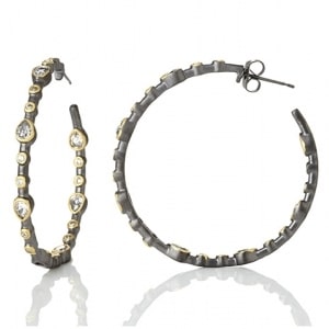 A pair of hoop earrings with 14k black gold plated sterling silver from Freida Rothman.