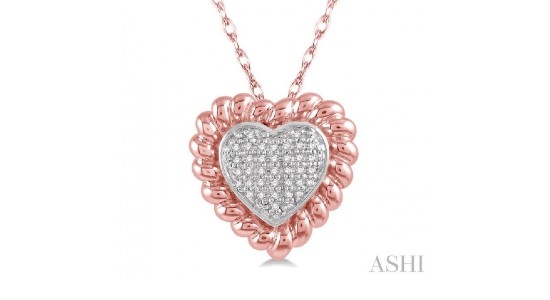 a white and rose gold heart pendant necklace with diamond details