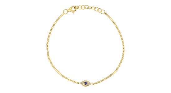 a yellow gold chain bracelet featuring an evil eye motif with a sapphire at its center