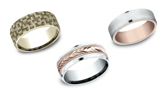 a textured, yellow gold men’s wedding band, and two mixed metal men’s wedding bands