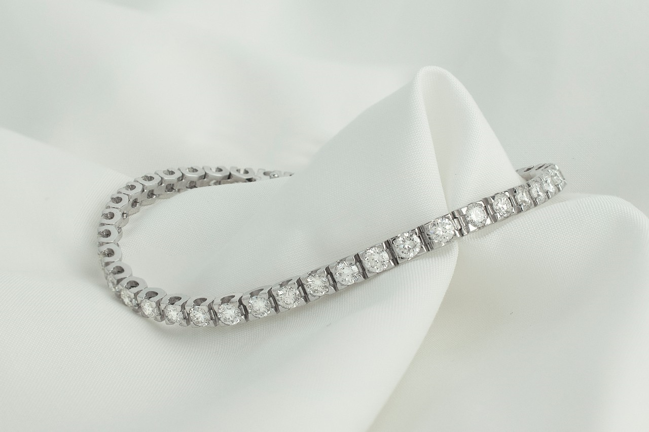 diamond tennis bracelet on a white background